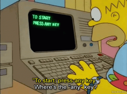 Homer Simpson looking for the Any Key