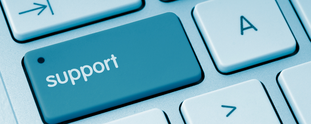 Close-up keyboard with blue support-key.