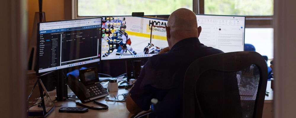 Man Sitting at Computer Desk